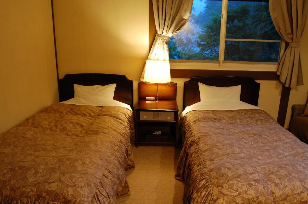 Petit Hotel Alumu Matsumoto Rum bild